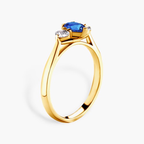 Pierścionek zaręczynowy SAVICKI: dwukolorowe złoto, niebieski szafir, białe szafiry